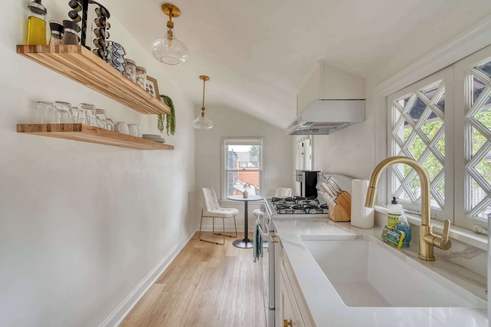 Kitchen workspace with dining nook by the window.