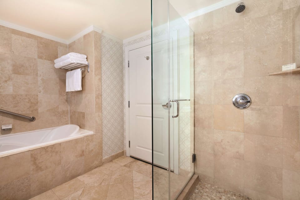 Shower, designer toiletries, hair dryer, bathrobes