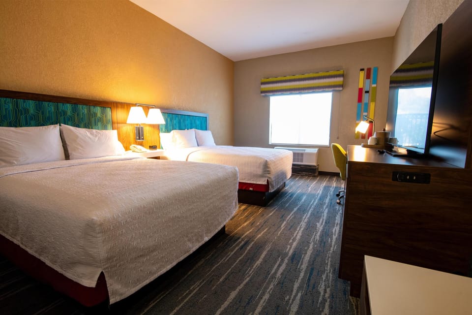 Room, 2 Queen Beds, Non Smoking | In-room safe, blackout drapes, iron/ironing board, free WiFi