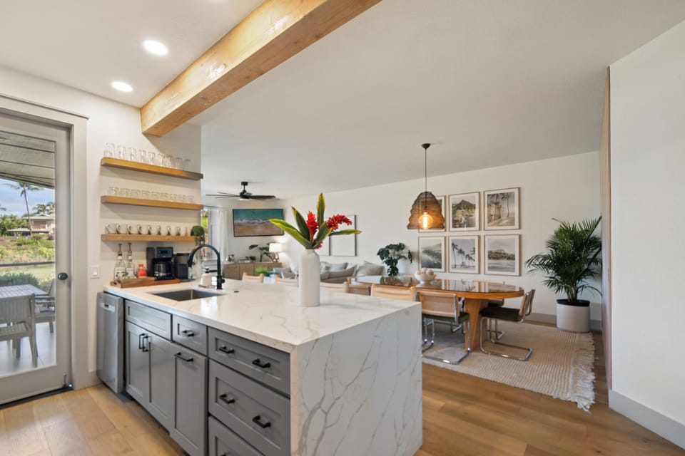 Cook, dine and unwind in this beautifully designed open-concept kitchen
