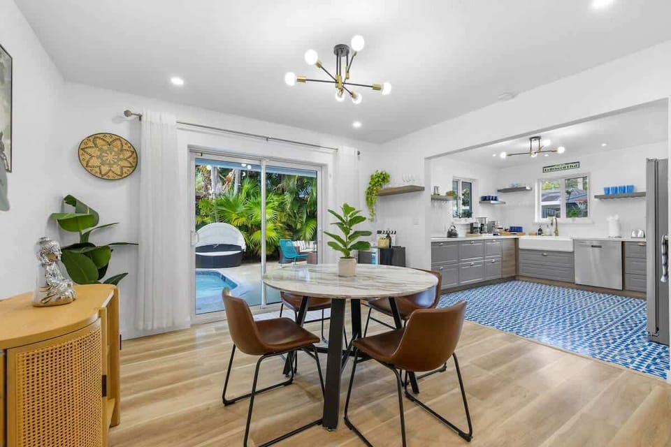 Dining Area: Savor meals with garden views in this stylish, sunlit dining space!
