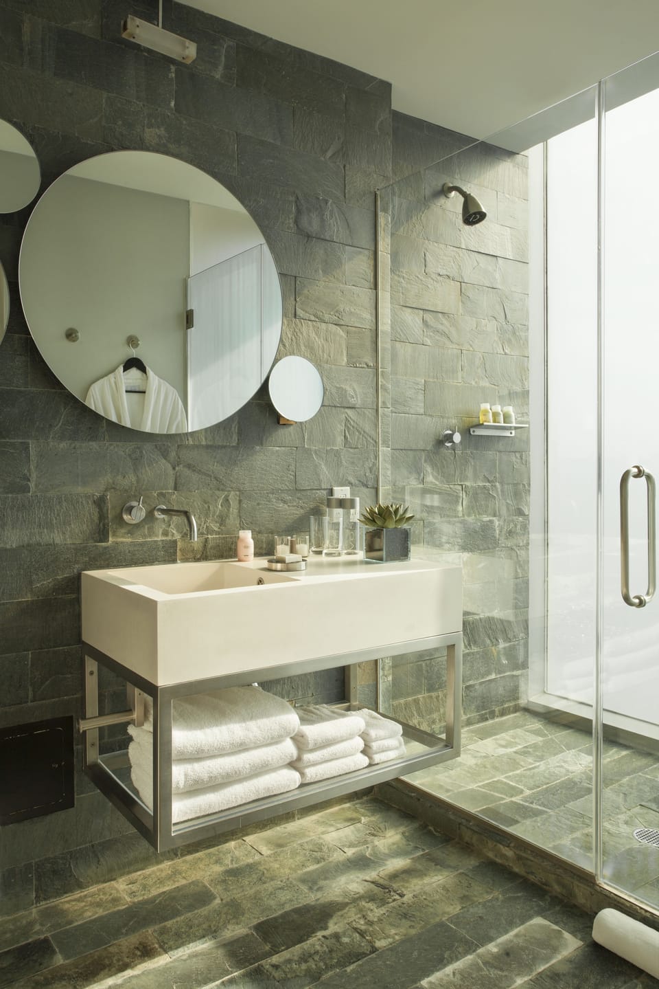 Shower, designer toiletries, hair dryer, towels