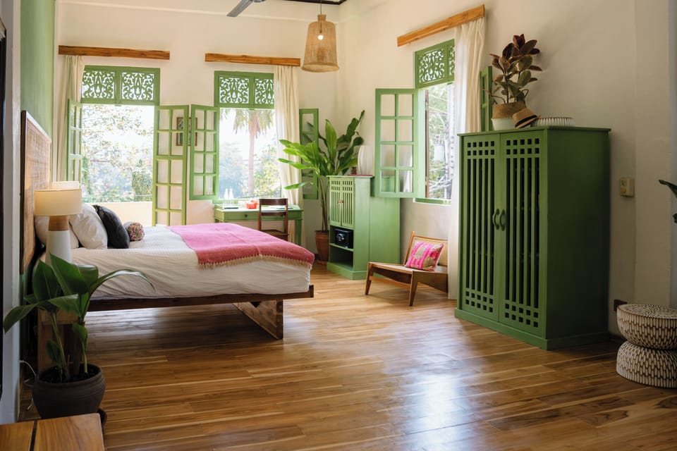 Deluxe Double or Twin Room, River View | Minibar, in-room safe, desk, free WiFi