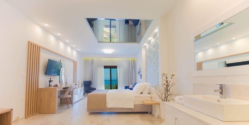 Honeymoon Suite, Sea View | Premium bedding, down comforters, pillowtop beds, in-room safe