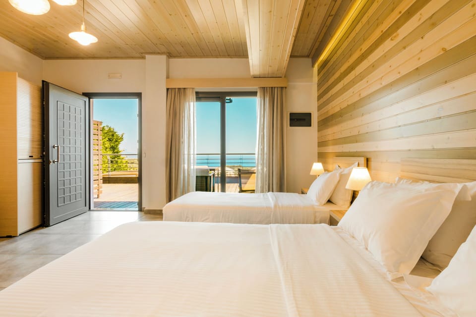 Deluxe Studio, Sea View (3 Guests) | Premium bedding, down comforters, pillowtop beds, in-room safe