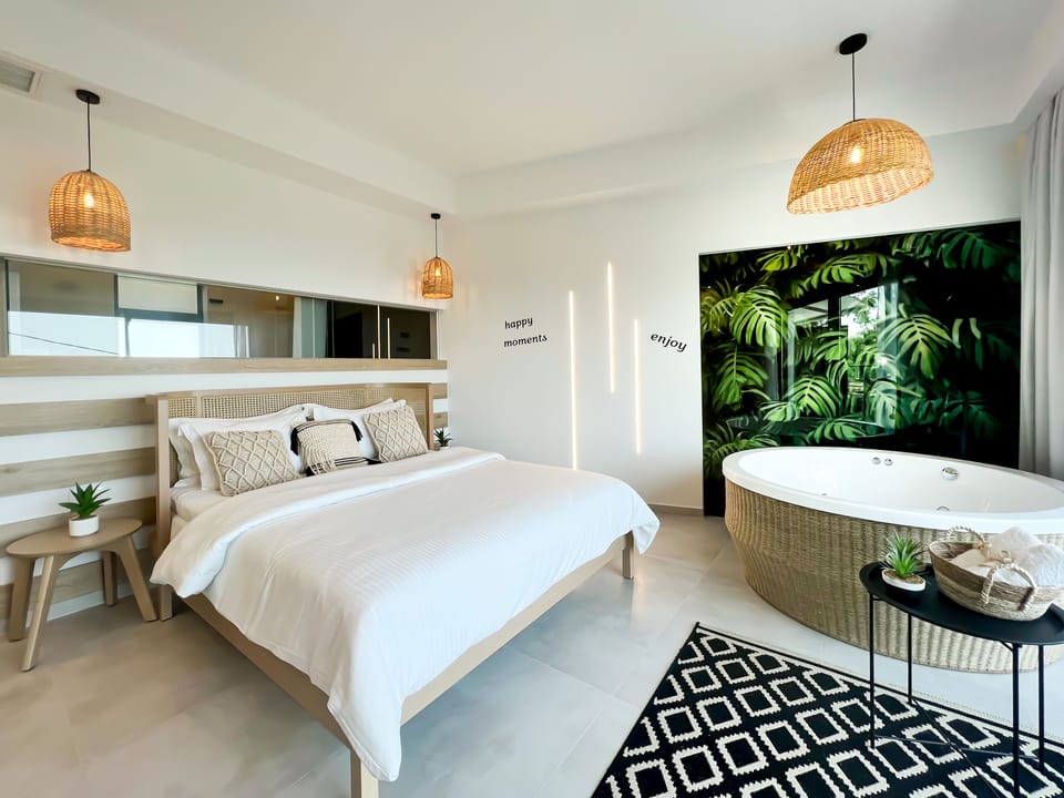 Escape Suite, Indoor Hot Tub, Sea View | Premium bedding, down comforters, pillowtop beds, in-room safe