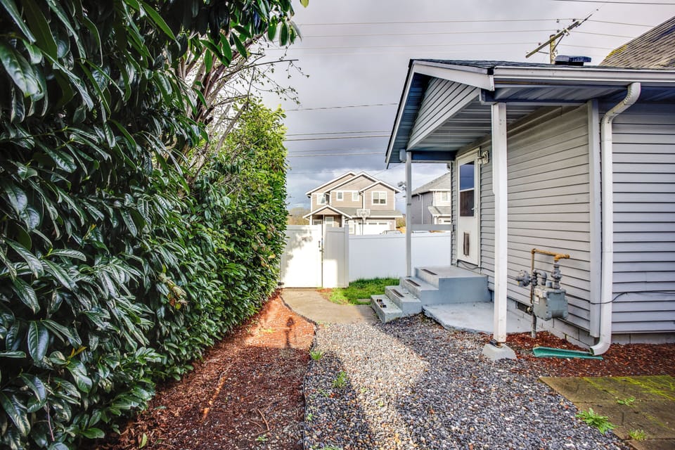 Property Exterior | Driveway Parking (4 Vehicles) | Fenced-In Backyard