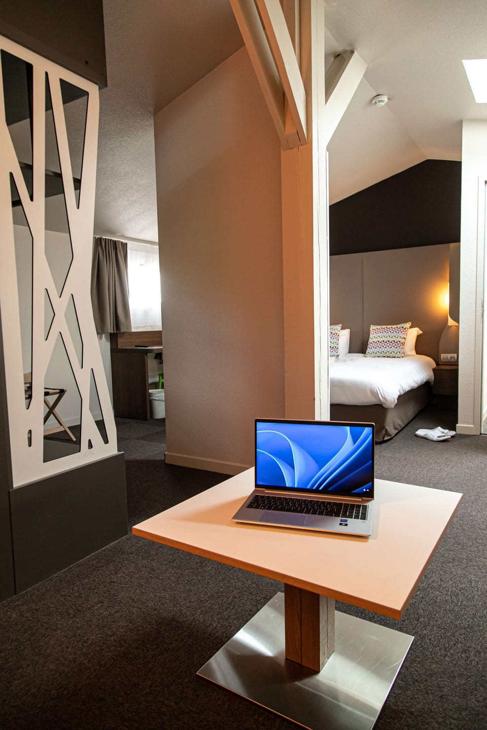 Premium bedding, desk, laptop workspace, soundproofing