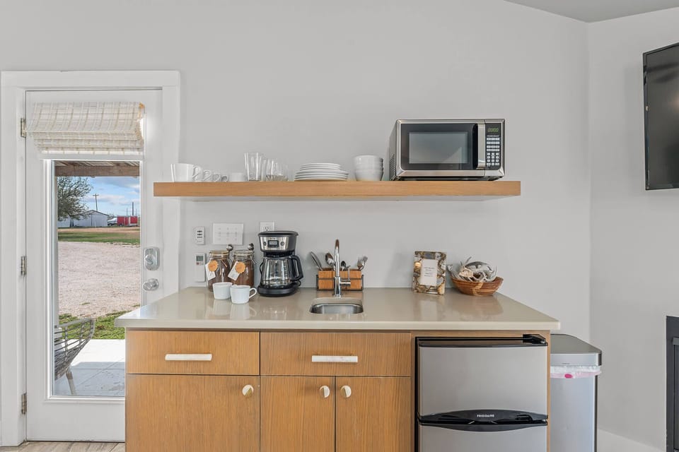 The kitchenette makes in-room comfort simple and stylish—store, sip, and snack without ever leaving your cozy hideaway.