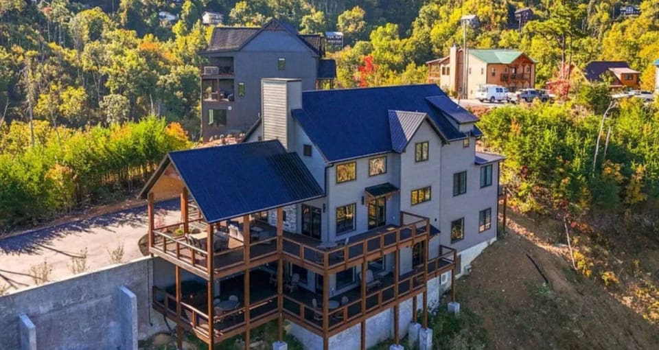 Enjoy this 5,000 sf luxury lodge with Smoky Mountain views for miles! 