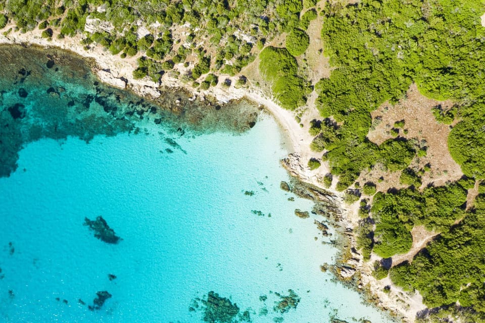 Cala Sabina beach from air