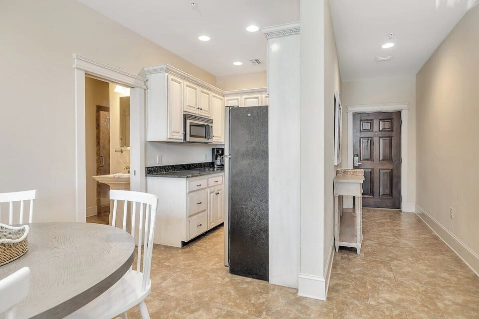 Sea Gate #101 View of Entry Hallway  and Kitchen from Dining Area
