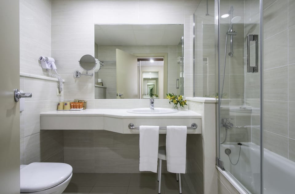 Hair dryer, towels, soap, shampoo