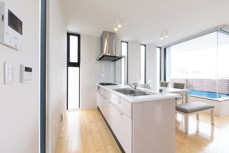Villa, Balcony | Private kitchen | Full-size fridge, microwave, stovetop, cookware/dishes/utensils