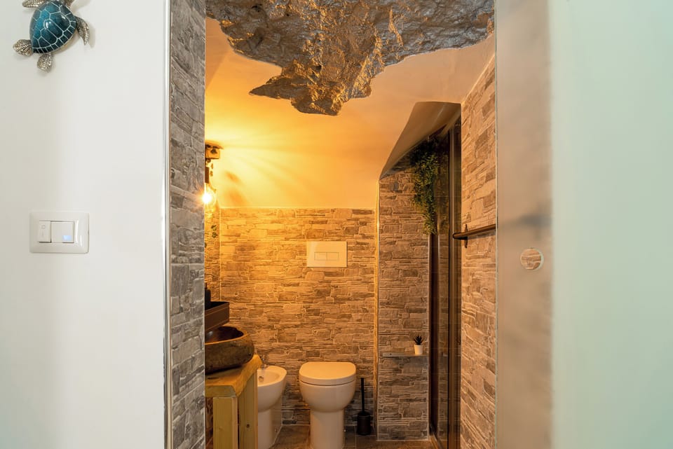 Superior Room | Bathroom | Shower, hair dryer, towels, soap