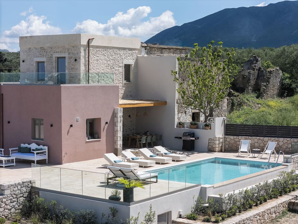 Surrounded by gardens filled with olive trees, fruit orchards, fragrant herbs, and a charming vineyard, the estate offers a beautiful getaway for guests of all ages.
