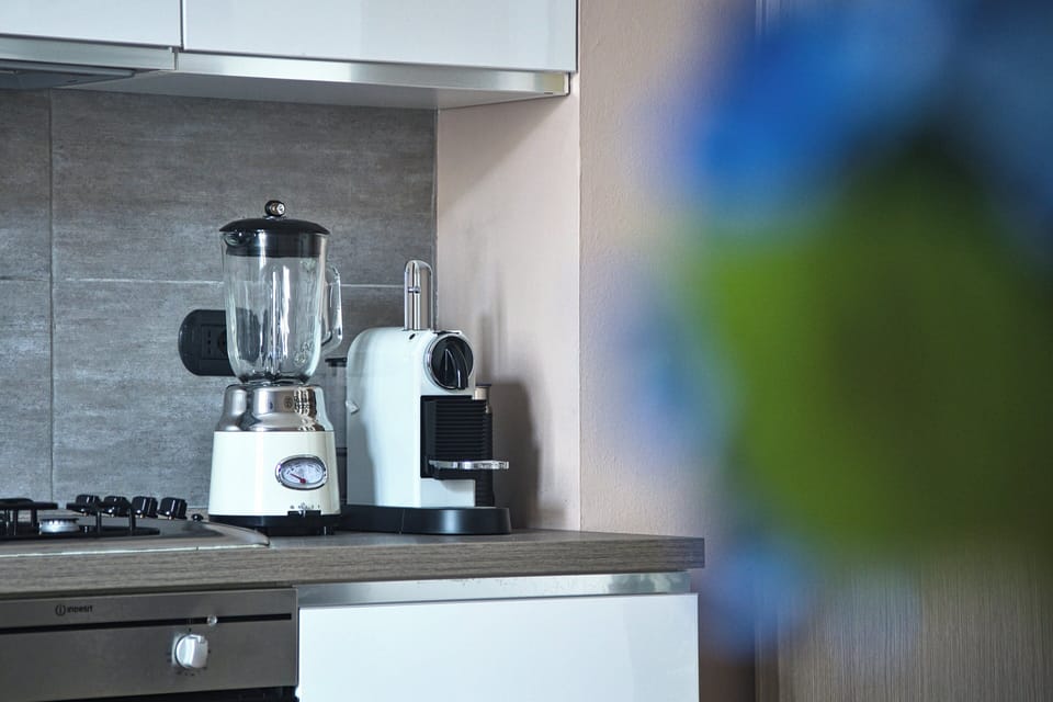 Apartment, 2 Bedrooms, Balcony | Private kitchen | Dining tables