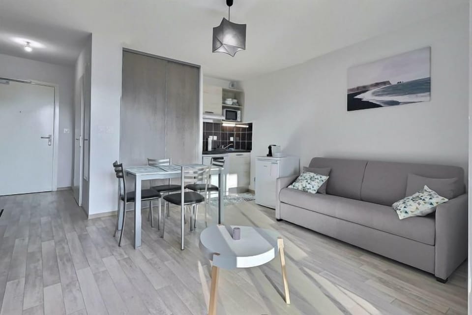 Sink into the cozy sofa after a day exploring the area.