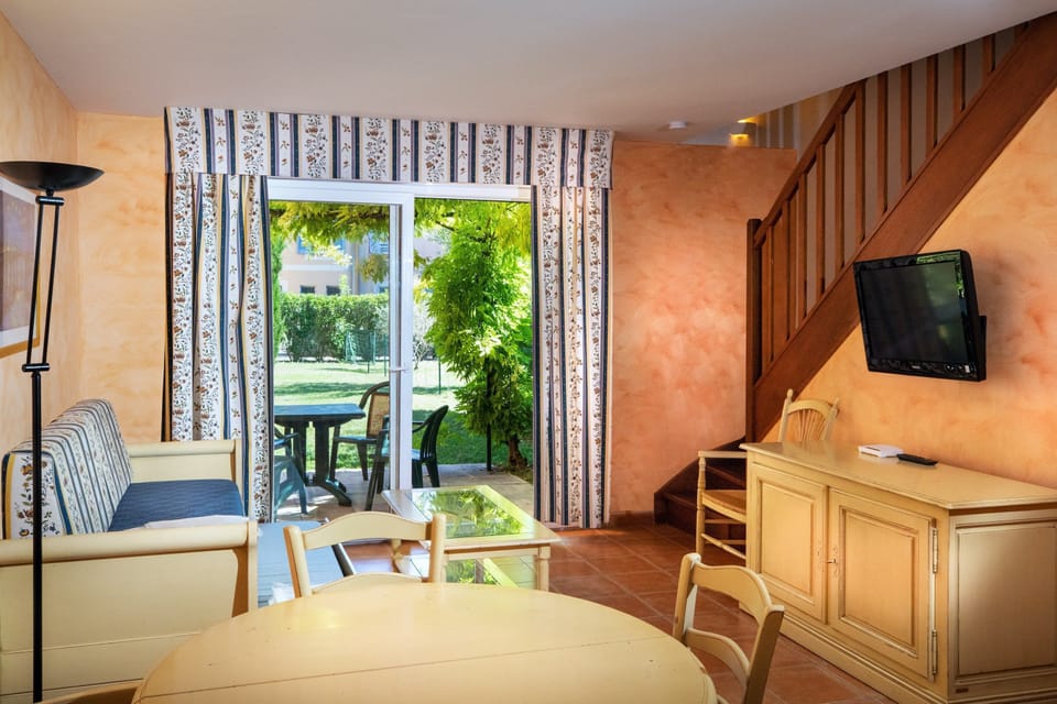 Enjoy a delicious meal around the dining table.