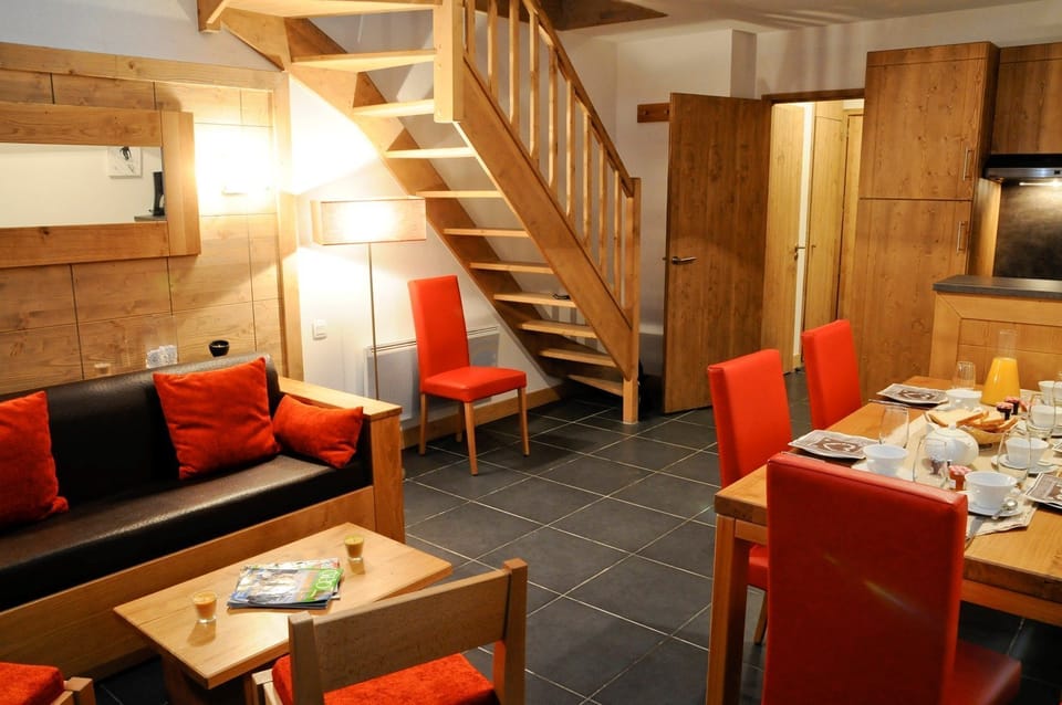 Prepare meals in the kitchenette and enjoy them at the dining table.