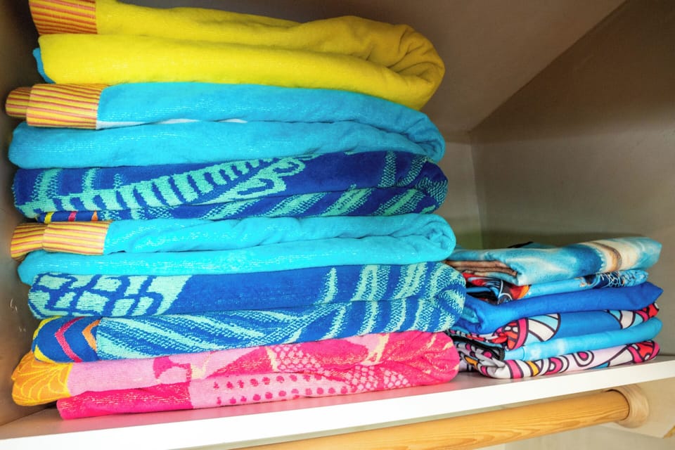Sun loungers, beach umbrellas, beach towels