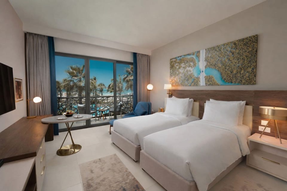 Deluxe Twin Room with Sea View | Premium bedding, desk, iron/ironing board, cribs (free)