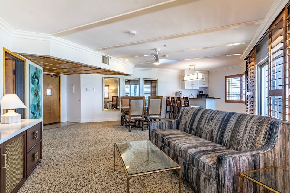 Grand Pacific Suite | Living area | 65-inch plasma TV with cable channels, TV, pay movies