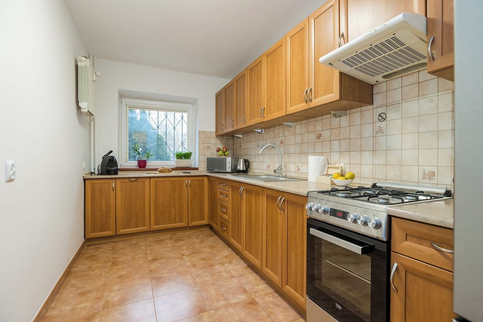 Classic Apartment, Balcony, Garden View | Private kitchen | Electric kettle
