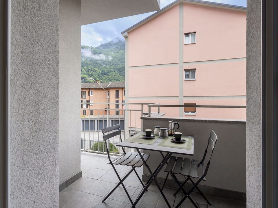 Apartment, Home, Chair, Balcony, Shade, Outdoor Furniture, Daylighting, Kitchen & Dining Room Table, Houseplant, Coffee Table