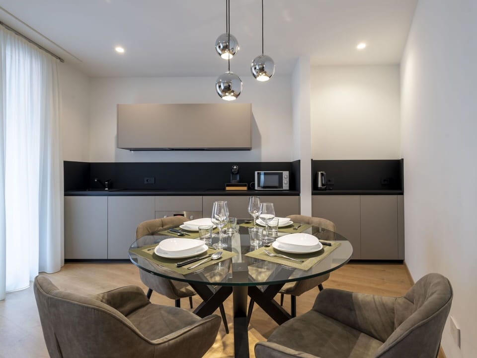 Furniture, Interior Design, Flooring, Wall, Light Fixture, Ceiling, Wood, Floor, Table, Room