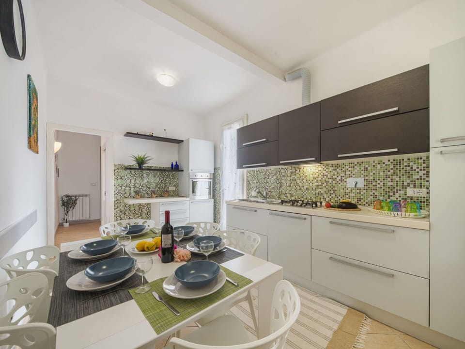 Interior Design, Kitchen, Countertop, Flooring, Kitchen Appliance, Major Appliance, Furniture, Floor, Ceiling, Room