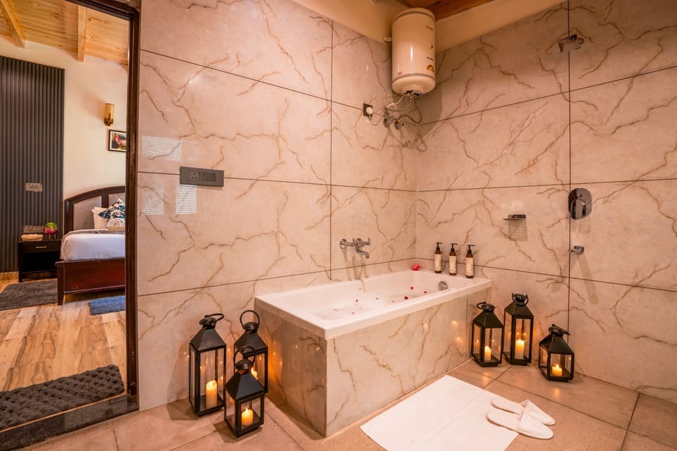 Suite with Lake View | Bathroom | Shower, towels, toilet paper