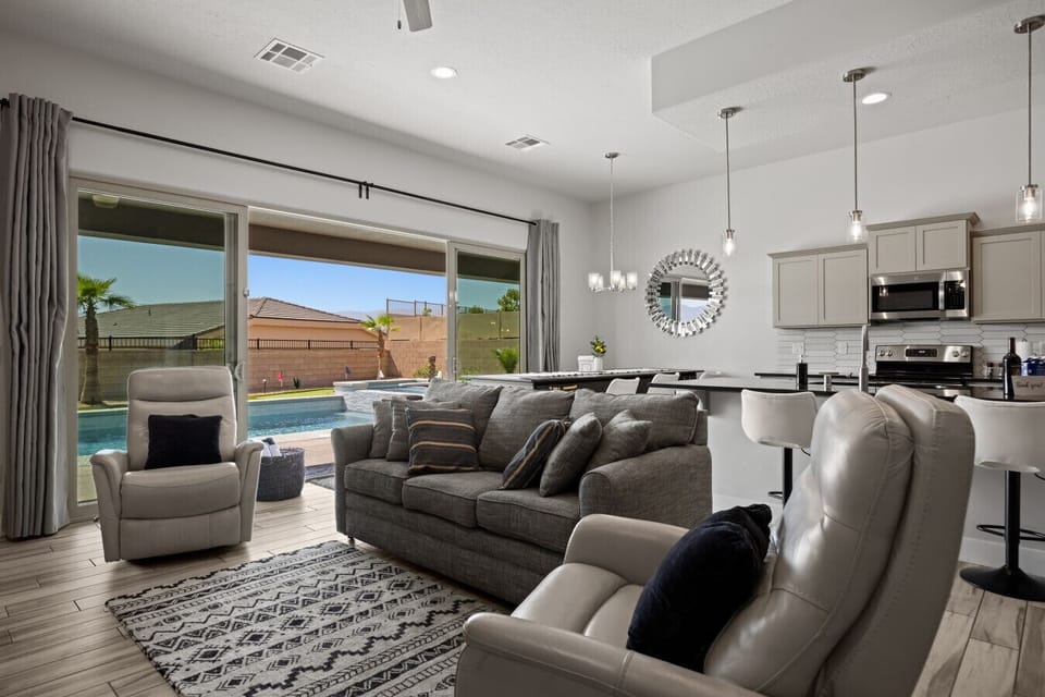 Comfortable living room furniture with couch and two recliners.