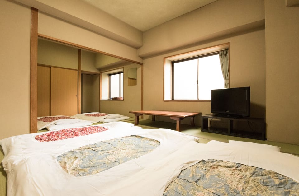 Traditional Room, Non Smoking | Desk, laptop workspace, blackout drapes, iron/ironing board