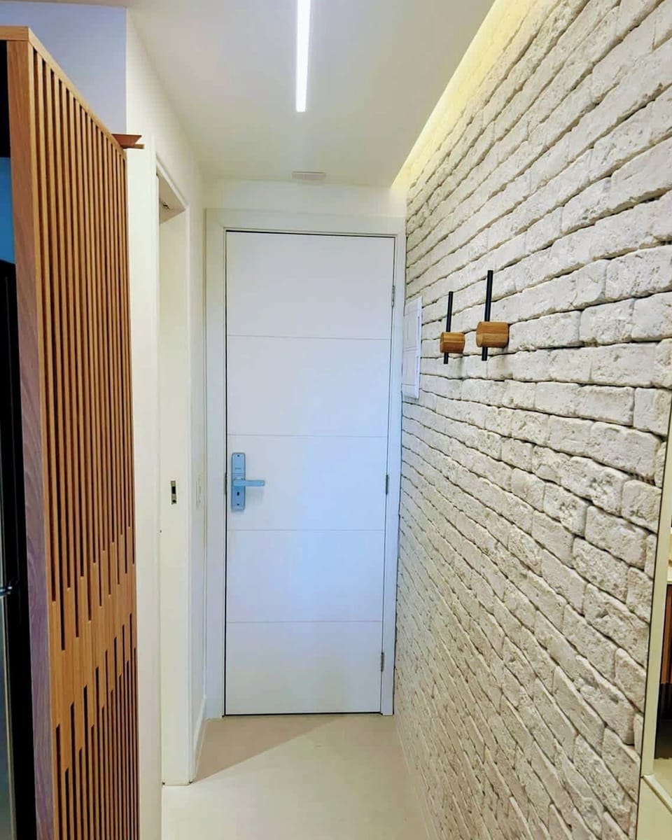 The apartment entry has LED accent lighting. The door has a smartlock for easy, self check-in.