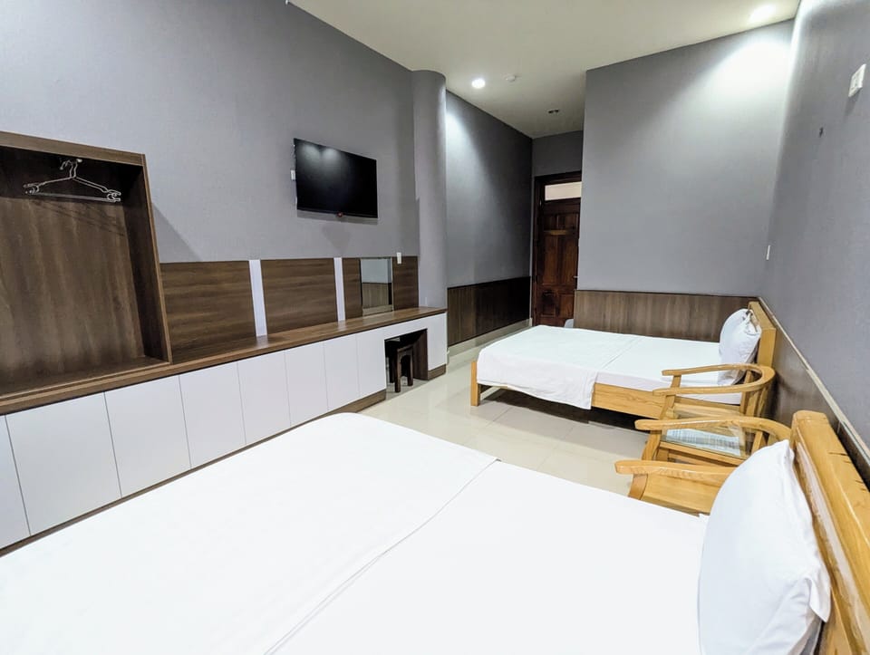 Standard Quadruple Room | Hypo-allergenic bedding, down comforters, desk, laptop workspace