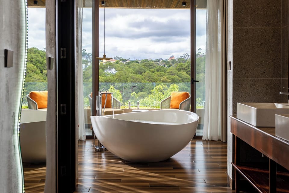 Deluxe Triple Room, Mountain View | Bathroom | Separate tub and shower, deep soaking tub, rainfall showerhead