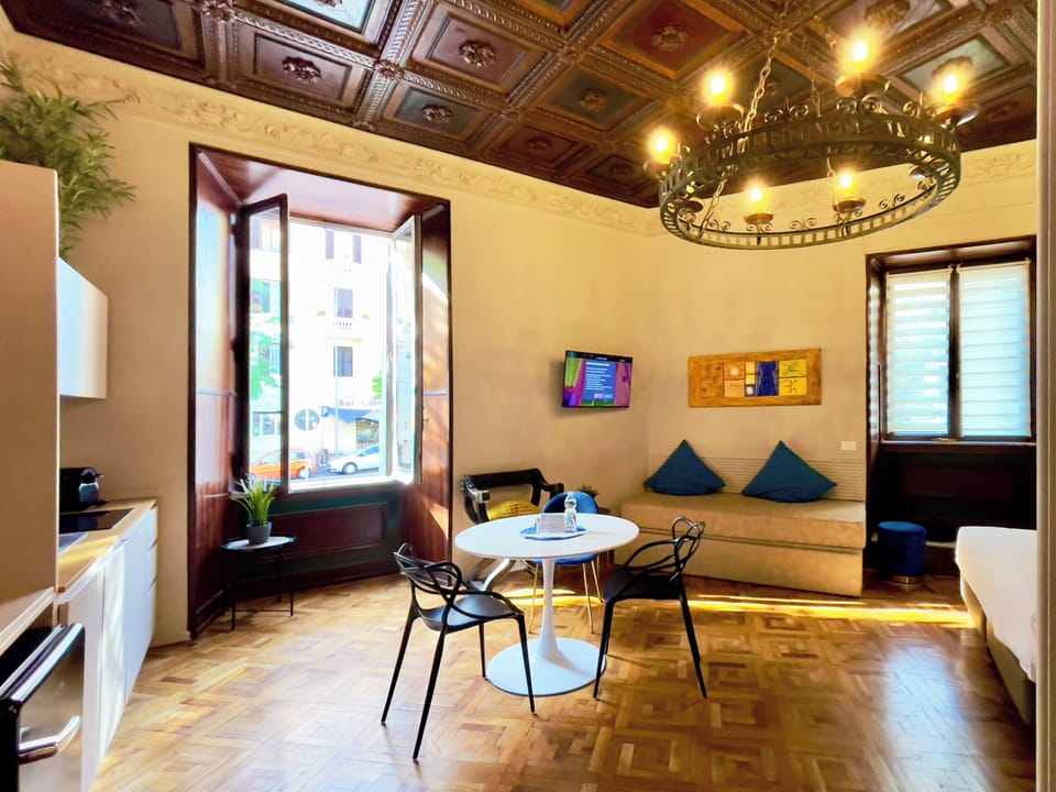 Family Studio Suite | Living area | 800-cm Smart TV with digital channels