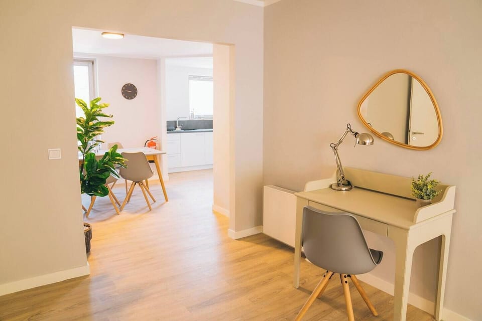Passageway from the living room to the dining room and kitchen.