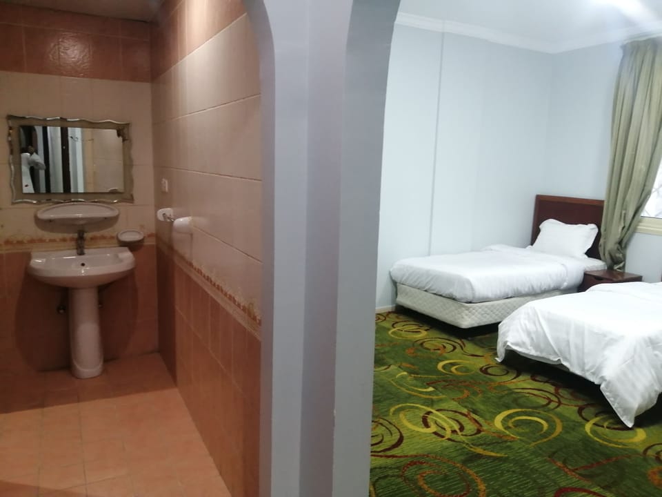 Room, Multiple Beds, Non Smoking, City View | Laptop workspace, free WiFi