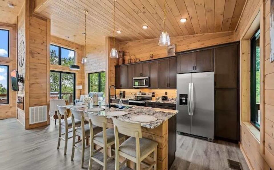 The inviting open kitchen offers ample space & every home comfort