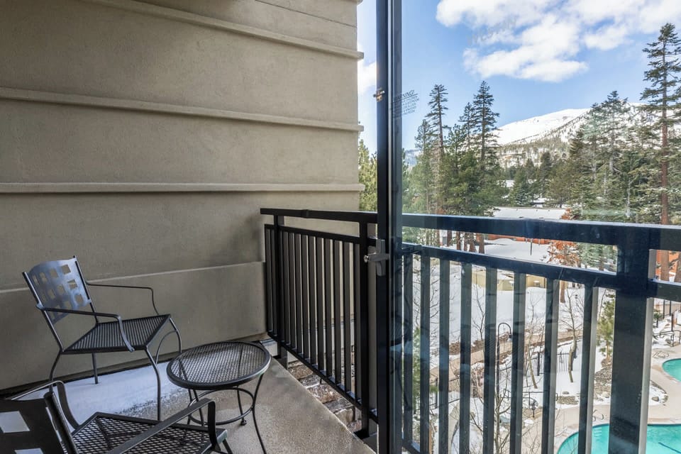 Take in the mountain air on the private balcony 