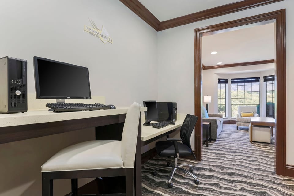 Stay productive at our on-site business center with dual monitors.
