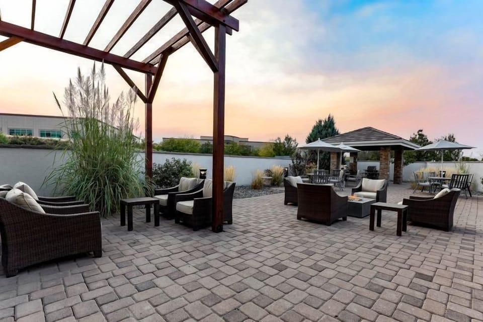 Unwind in our inviting outdoor seating area with a charming gazebo.