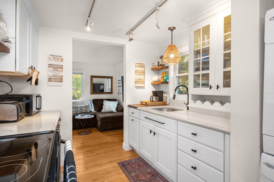 The kitchen is equipped with a coffee maker! 