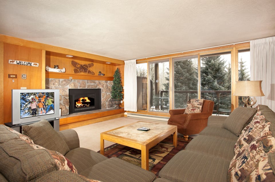 Kick back your feet and relax in the cozy living area.