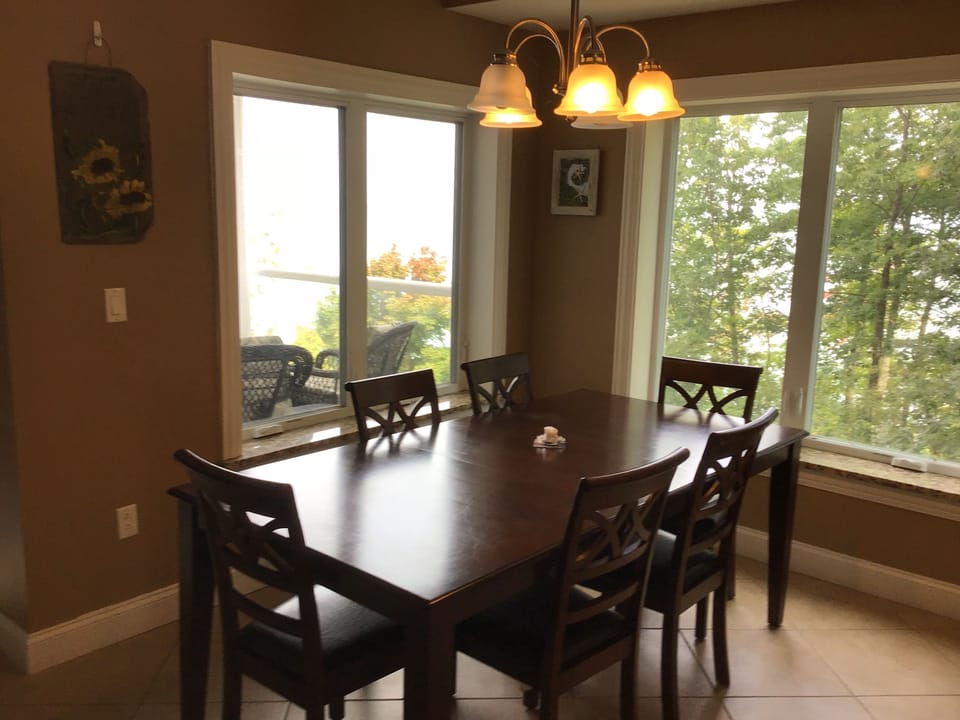 Seating for 6 with lake view from dining table