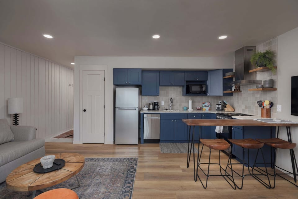 The open kitchen offers ample space & all the comforts of home