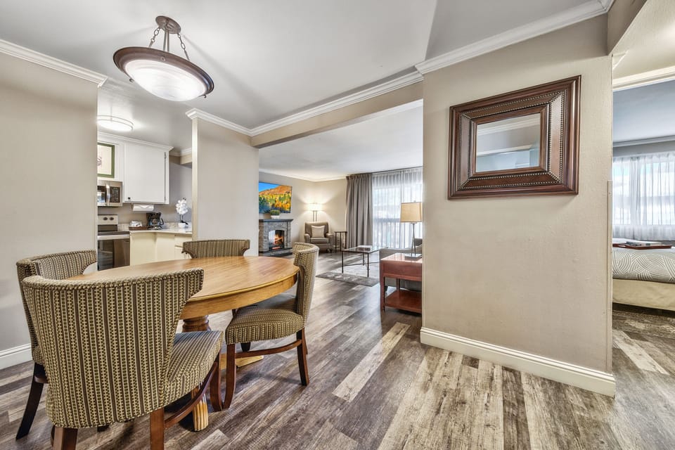 An open and airy dining space seamlessly connecting to the living area, creating the perfect atmosphere for shared moments and relaxation.
