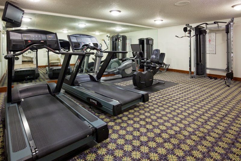 Stay active in our well-equipped fitness center, ready for your workout.